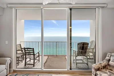 a living room with a view of the ocean at Tidewater 2411 - Tidewater Retreat - Sleeps 8 in Panama City Beach