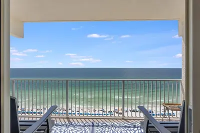a view of the ocean from the balcony of a condo at Shores of Panama 1403 - 3 BR 2 Ba Newly Renovated in Panama City Beach