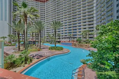 an image of a swimming pool at a resort at Shores of Panama 1307, Two Masters! in Panama City Beach
