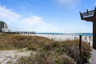 a view of a beach with a pier at Shores of Panama 727 - Same level parking space! in Panama City Beach