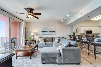 a living room with a couch and a table at Shores of Panama 2115, 2BR 2 BA, sleeps 6 in Panama City Beach