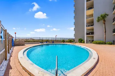 a swimming pool in the middle of a building at Moondrifter 804 - Sleeps 6 - 2 BR 2 BA with bunks in Panama City Beach