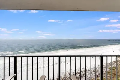 a view of the beach from the balcony of a condo at Edgewater T3 #802 - 2 BR 2 BA Amazing views in Panama City Beach
