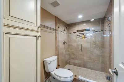 a bathroom with a toilet and a shower at Edgewater Tower 1 #609 - Lagoon Tower - 2 BR 2 BA in Panama City Beach