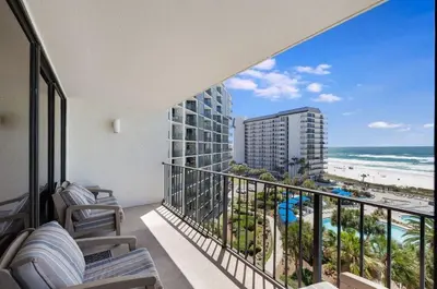a balcony with a view of the beach and the ocean at Edgewater Tower 1 #609 - Lagoon Tower - 2 BR 2 BA in Panama City Beach
