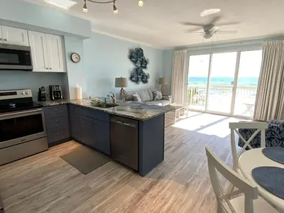 a kitchen with a sink and a counter top at Celadon 207 beachfront 1 BR 2 BA Sleeps 6 in Panama City Beach
