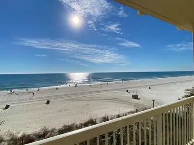 a view of the beach from the balcony of a condo at Celadon 207 beachfront 1 BR 2 BA Sleeps 6 in Panama City Beach