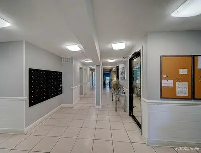 a hallway of a hospital with a hallwayngth at Mariner East #201 1 BR 2 BA Amazing Balcony! in Panama City Beach