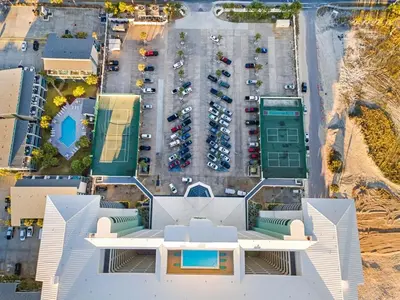 an aerial view of a parking lot with a building at Watercrest 502 - Perfect Family Getaway 2BR 2 BA in Panama City Beach