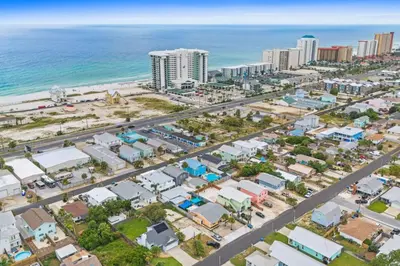 an aerial view of a city and the ocean at Spacious Dog-Friendly Duplex w/ Bonus Game Room & Private Backyard Near Beach in Panama City Beach