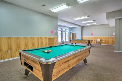 a billiard room with a pool table in it at Walk to Beaches Resort Getaway Near Pier Park! in Panama City Beach