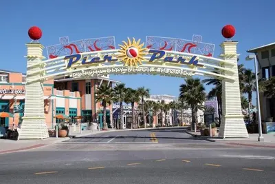 an empty street with a sign for a theme park at Splash Ocean-front Luxury Two-bedroom Beach Condo in Panama City Beach