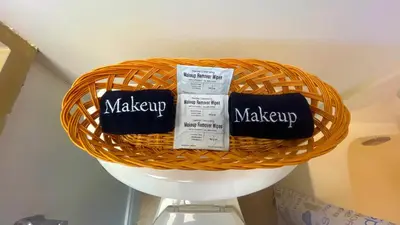 a wicker basket with makeup products on a shelf at Sunbird Resort 8th Floor Sunsets - by Sunbird Rentals in Panama City Beach