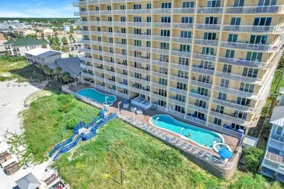an aerial view of a large building with a pool at Seychelles Unit 1205 in Panama City Beach