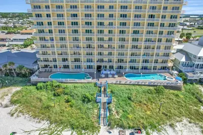 an aerial view of a large building on the beach at Seychelles Unit 1205 in Panama City Beach