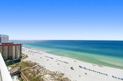 an aerial view of a beach with the ocean at Sunrise Beach 14th-Floor Gulf-Front Condo Pools, Bunks & Balcony Views in Panama City Beach