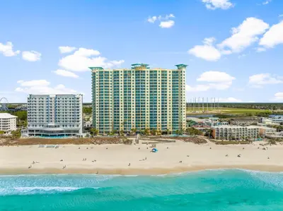 an aerial view of a beach and buildings at Aqua Beach Resort by Panhandle Getaways in Panama City Beach