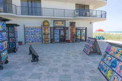 a building with paintings on the side of it at Edgewater Beach & Golf Resort by Panhandle Getaways in Panama City Beach