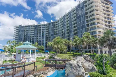 a large building with a gazebo in front of a resort at Edgewater Beach & Golf Resort by Panhandle Getaways in Panama City Beach