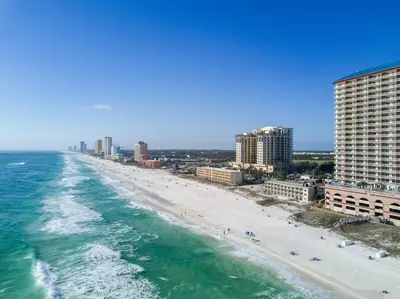 a view of a beach with buildings and the ocean at Emerald Beach by Panhandle Getaways in Panama City Beach