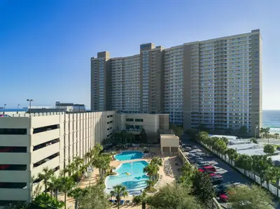 an aerial view of a resort with a swimming pool at Emerald Beach by Panhandle Getaways in Panama City Beach