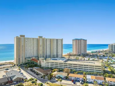 an aerial view of a resort with the ocean at Emerald Beach by Panhandle Getaways in Panama City Beach
