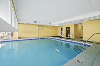a large swimming pool in a hotel room at Emerald Isle by Panhandle Getaways in Panama City Beach
