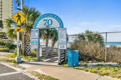 a sign on the side of a beach at Endless Summer by Panhandle Getaways in Panama City Beach