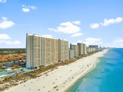 an aerial view of a beach with buildings and the ocean at Majestic Beach Resort Tower I by Panhandle Getaways in Panama City Beach