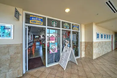 a grocery store with a sign in front of it at Majestic Beach Towers Resort by Panhandle Getaways in Panama City Beach