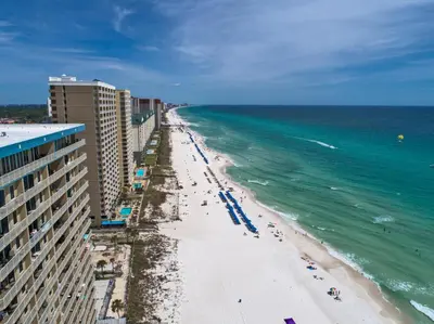 an aerial view of a beach with buildings and the ocean at Majestic Beach Towers Resort by Panhandle Getaways in Panama City Beach