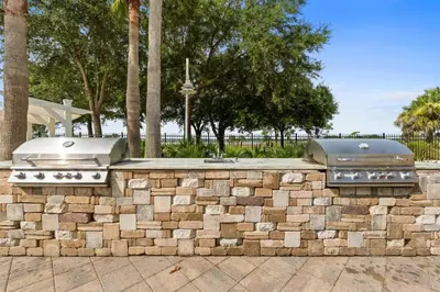 twourgers on a brick wall in a park at Reflections by Panhandle Getaways in Panama City Beach