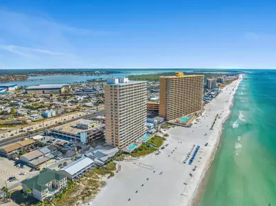 an aerial view of a beach with buildings and the ocean at Seychelles Resort by Panhandle Getaways in Panama City Beach