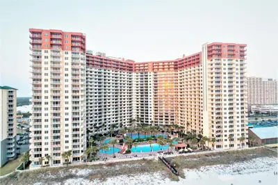 a large building with a pool and a resort at Shores of Panama by Panhandle Getaways in Panama City Beach