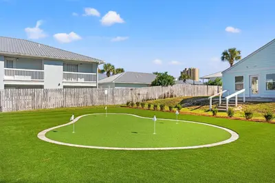 a circle in the middle of a grassy yard at Southwind by Panhandle Getaways in Panama City Beach