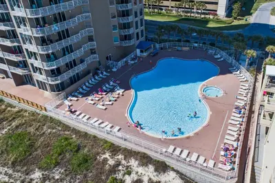 an overhead view of a swimming pool at a resort at Tidewater Beach Resort by Panhandle Getaways in Panama City Beach