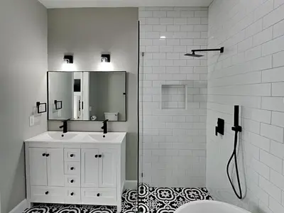 a bathroom with a shower and a sink and a mirror at Sunset On Seabreeze in Inlet Beach