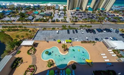 an aerial view of a pool at a resort at Laketown Wharf 2115 Penthouse with Gulf Views in PCB - Sleeps 6 in Panama City Beach