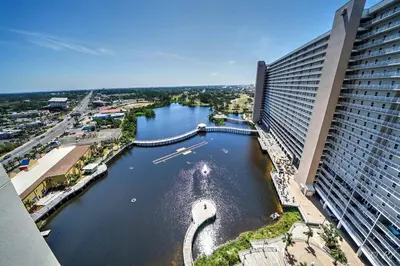 a view of a river in front of a building at Laketown Wharf 2115 Penthouse with Gulf Views in PCB - Sleeps 6 in Panama City Beach