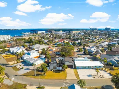 an aerial view of a small town with houses at Tiny Treasure by Nautical Properties Vacation Rentals in Panama City Beach