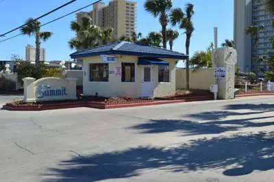 a small building on the side of a street at The Summit Condominiums in Panama City Beach