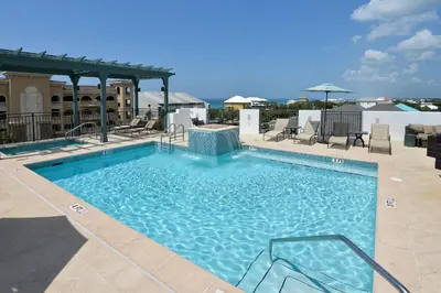 a large swimming pool on top of a building at WaterHouse 202 in Inlet Beach