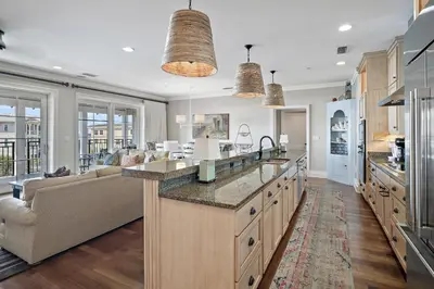 a large kitchen with a couch and a kitchen island at WaterHouse 402 in Inlet Beach