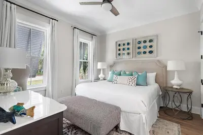 a white bedroom with a bed and a window at 28 Dalton Drive in Santa Rosa Beach