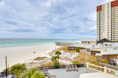 a view of the beach from the balcony of a condo at Gulf-View Balcony Beachfront Condo in PCB! in Panama City Beach