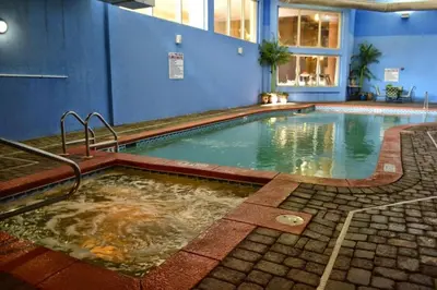 a swimming pool in the middle of a building at Shores of Panama 2302 condo in Panama City Beach