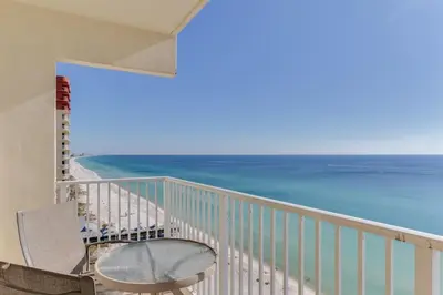 a balcony with a view of the ocean at Shores of Panama 1602 condo in Panama City Beach