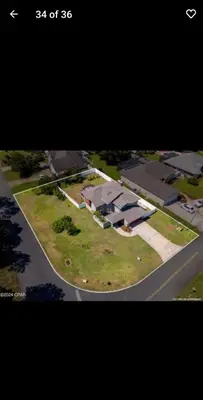 an aerial view of a house with a street at Spacious 3BR Family Beach Home 5 Mins to Panama City Beach & Sleeps 9 Hot tub in Panama City Beach