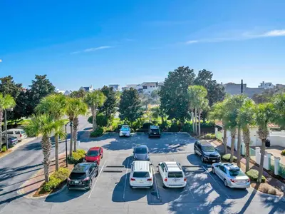 an aerial view of a parking lot with cars at Inn at Seacrest 309- Somewhere in the Sun in Inlet Beach