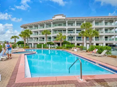 a pool in front of a hotel at Inn at Seacrest 309- Somewhere in the Sun in Inlet Beach